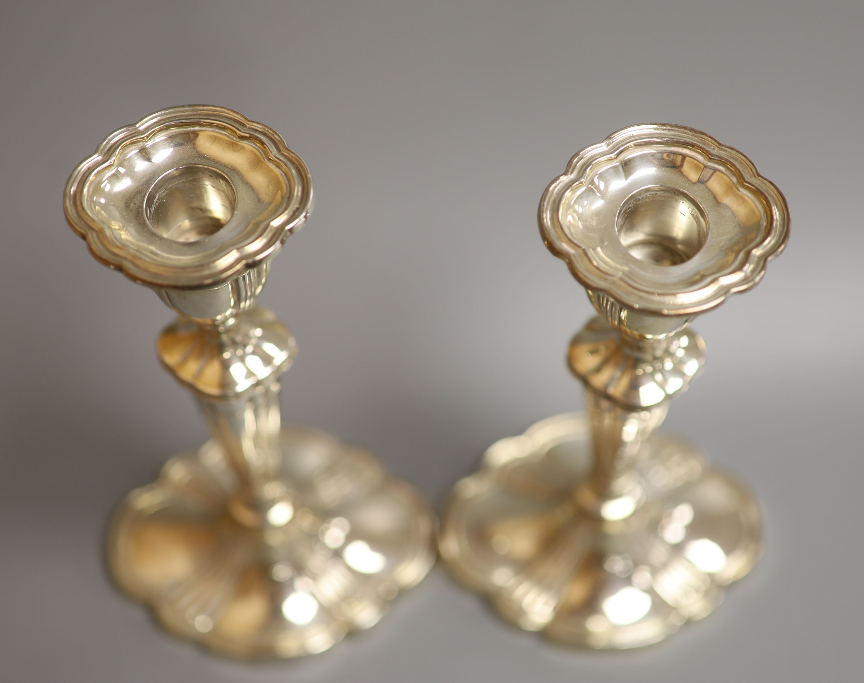 A pair of modern silver shaped oval candlesticks, C.J. Vander Ltd, Sheffield, 1994, 21.1cm